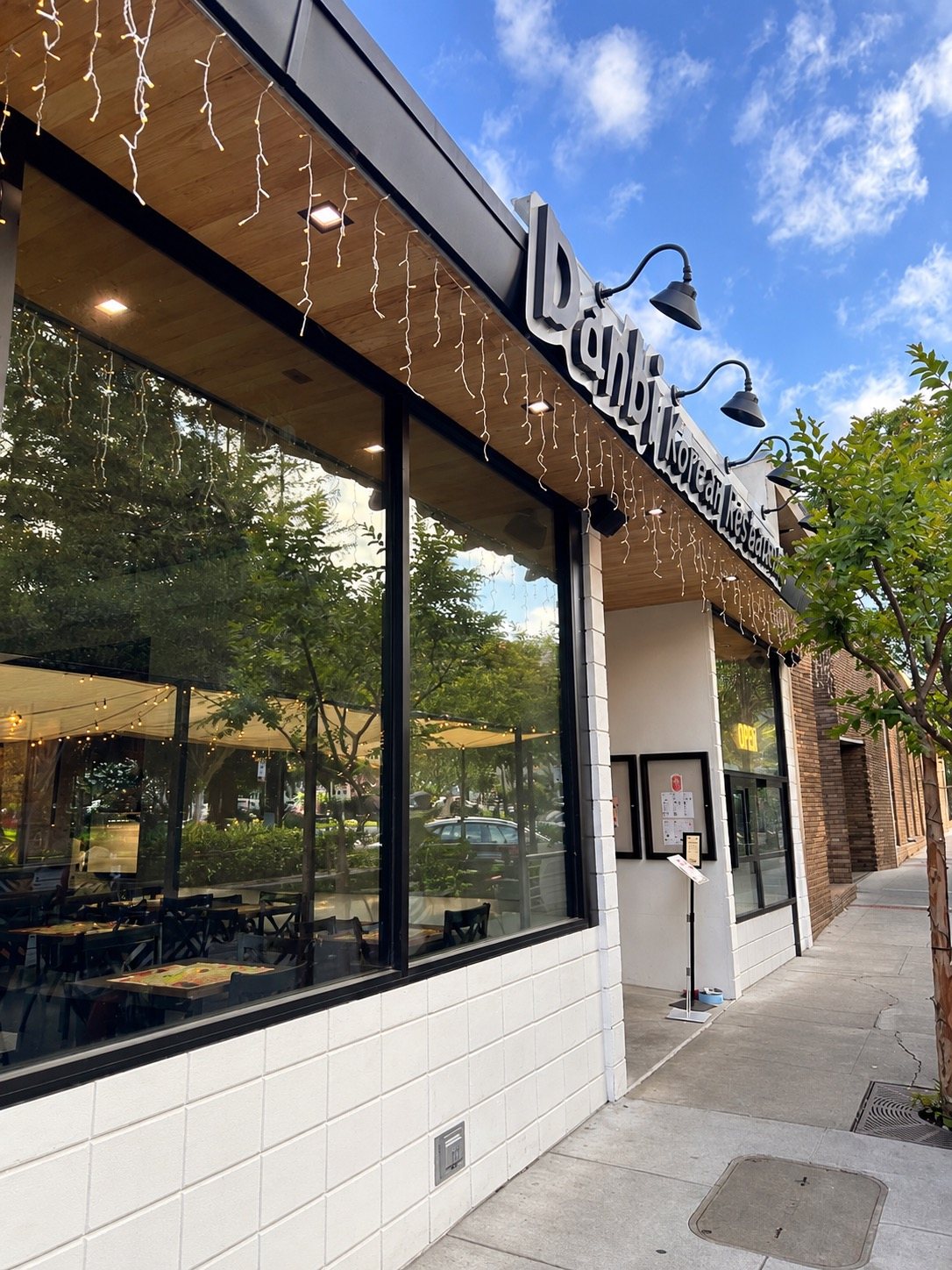 Danbi Korean Restaurant's storefront on Montebello Way in downtown Los Gatos, with string lights and big front windows